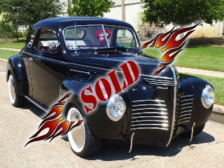 Right front 1940 Plymouth Custom Coupe